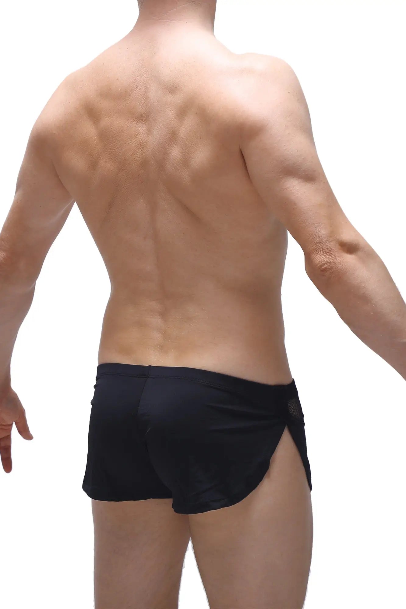 Black short lounge athletic shorts with a sleek form-fitting design and side slits for comfort and mobility