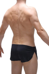 Black short lounge athletic shorts with a sleek form-fitting design and side slits for comfort and mobility