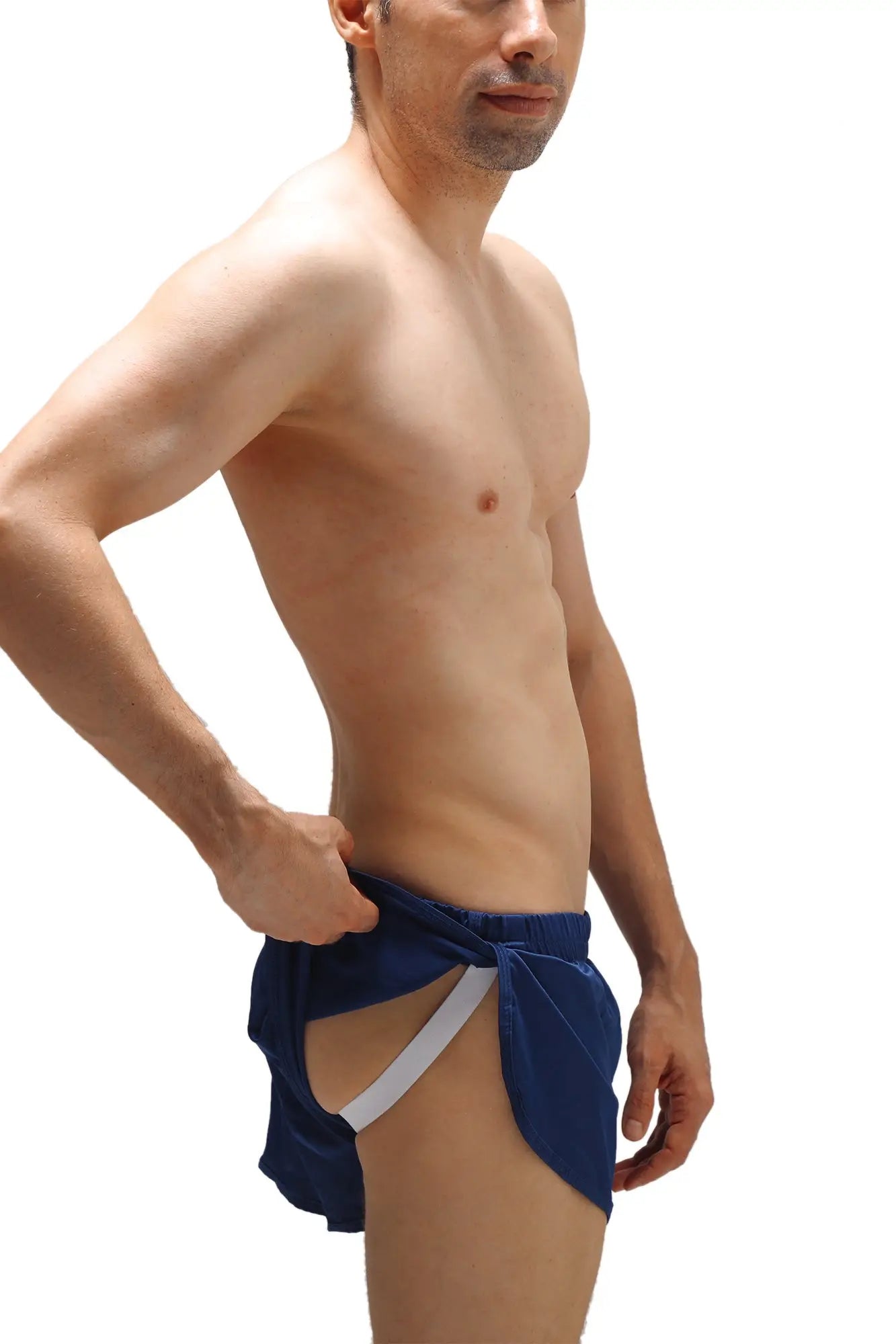 Navy blue velvet tie-front swim trunks with white elastic waistband in short satin style with jockstrap design