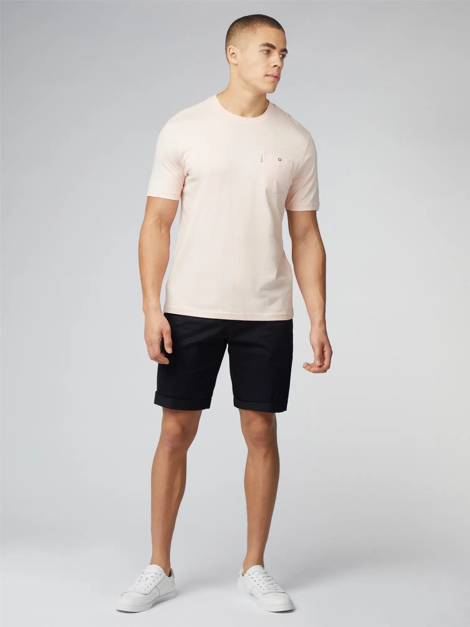 Pale pink short-sleeved crew neck signature t-shirt with small embroidered logo and chest pocket for casual wear
