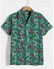 Teal sketchbook cosmos s s shirt with vibrant pink and dark green floral pattern on short sleeved hawaiian fabric