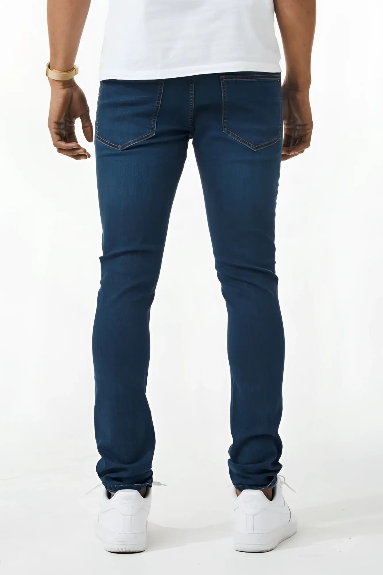 Dark blue skinny fit denim jeans with a classic five-pocket design in slim-fit style