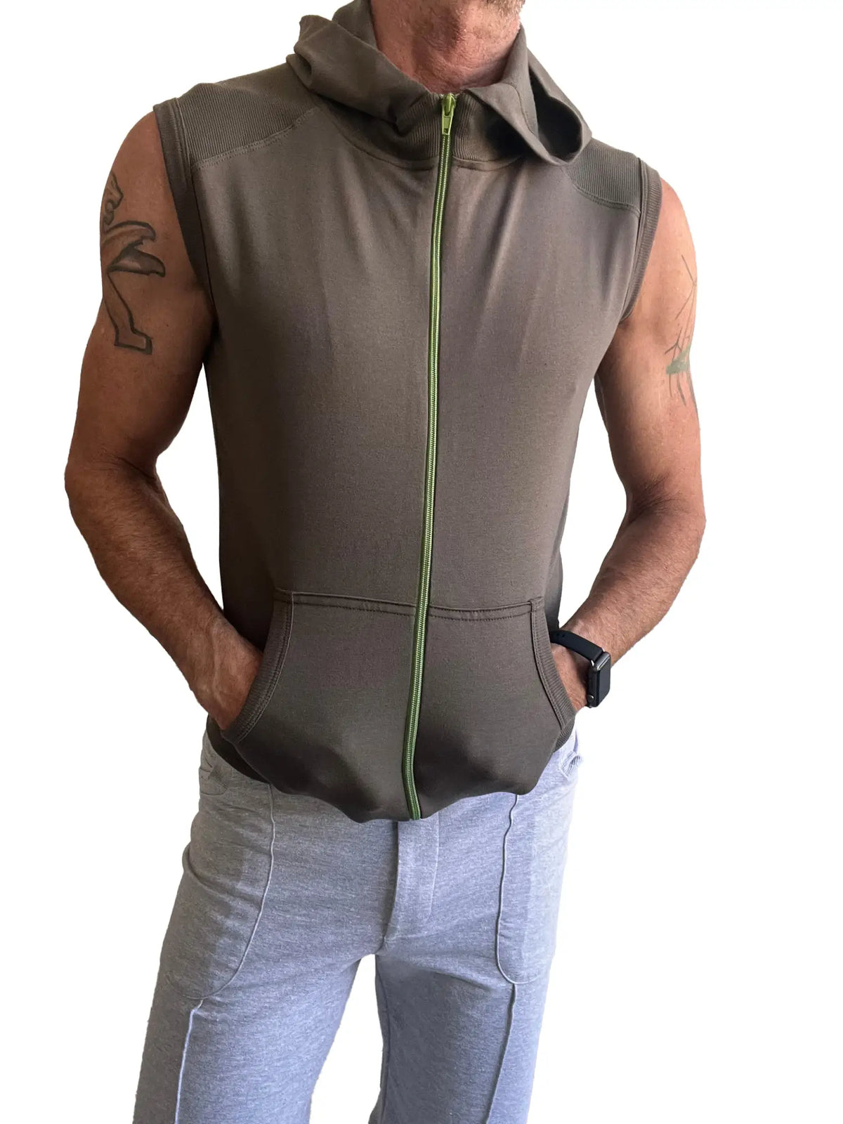Olive green sleeveless yoga hoodie with bright lime zipper and front pockets designed for activewear comfort