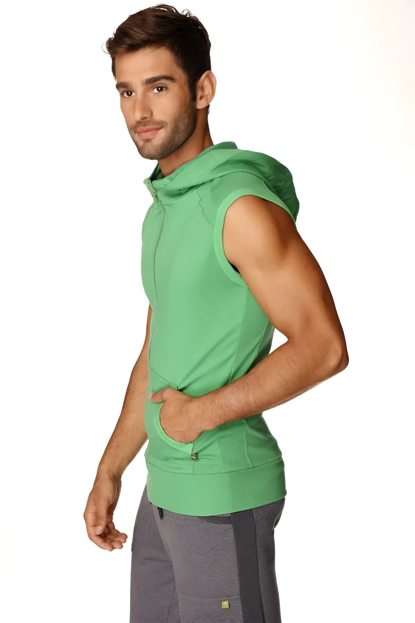 Sleeveless yoga hoodie in bamboo green with a hood and front pocket designed for comfortable workout wear