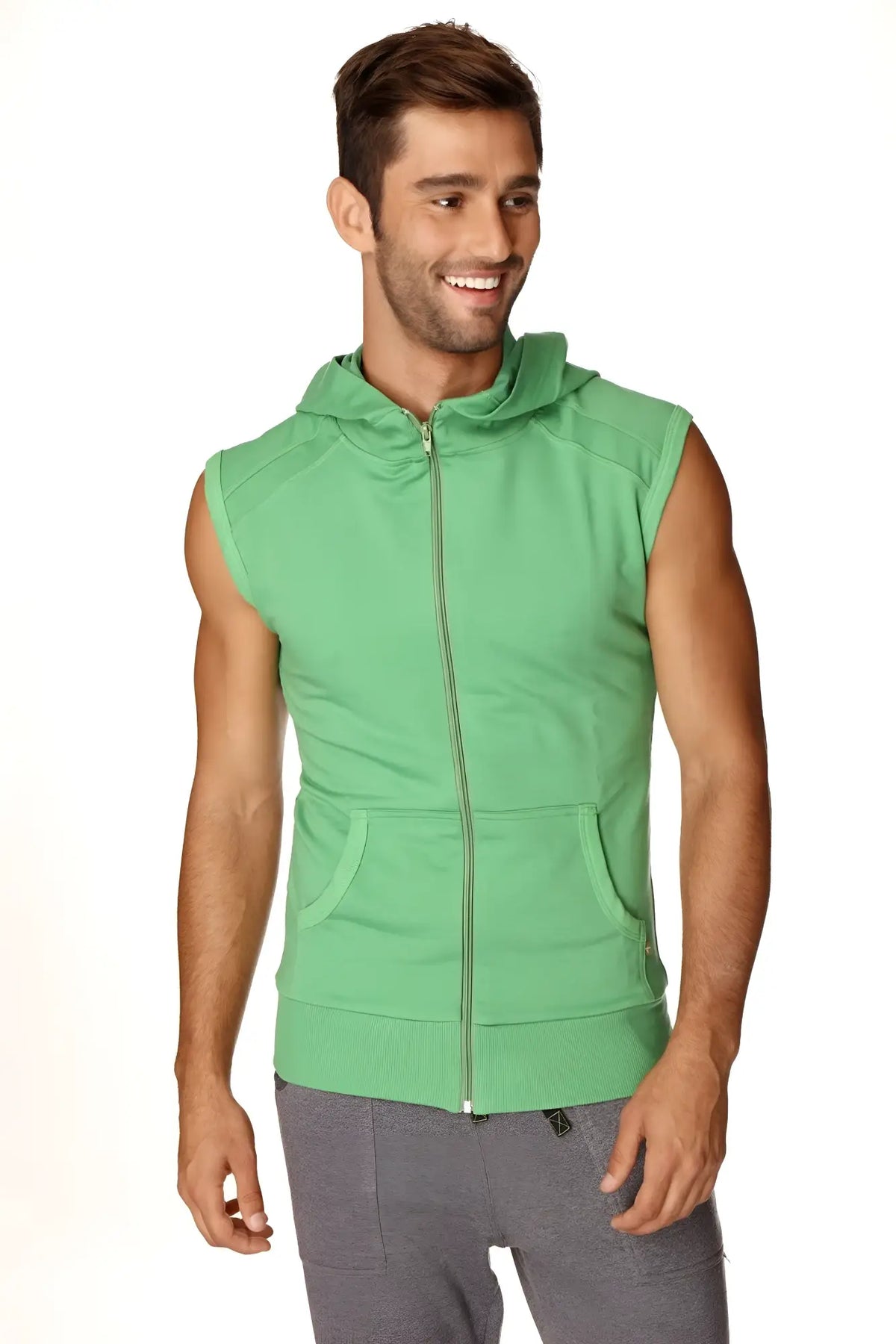 Green sleeveless yoga hoodie made of bamboo fabric with a zip-up front hood and pockets for workout comfort