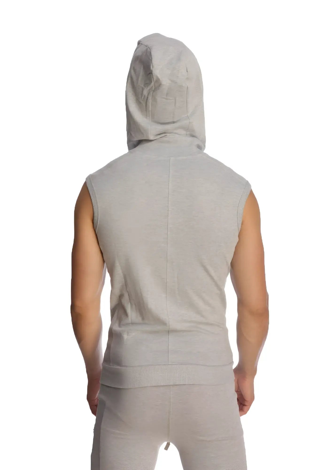 A light gray heather sleeveless yoga hoodie with a front seam and hood worn by a person