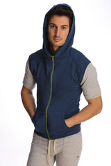 Navy blue sleeveless yoga hoodie with lime green zipper and gray short sleeves made for comfortable workouts