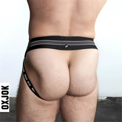 Black oxjok slingjock jockstrap with silver horizontal stripes and white logo on the waistband in front view