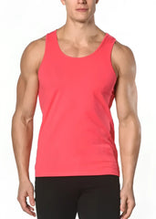 A vibrant coral solid stretch jersey tank top with a sleeveless design and a simple round neckline
