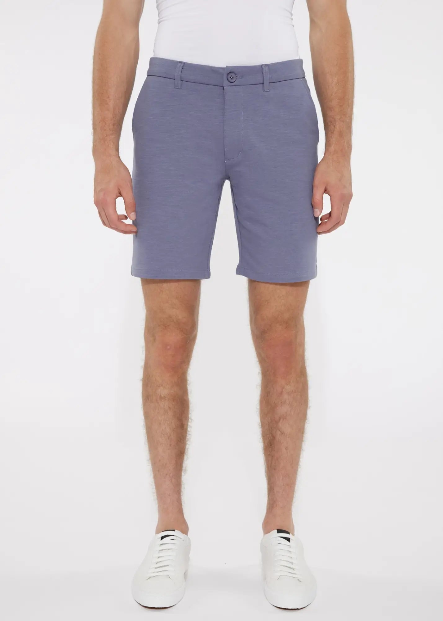 A pair of men’s tailored solid light blue stretch knit shorts with belt loops and single button closure