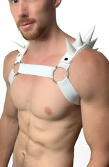 White spiked bulldog harness with leather straps and circular metal rings for durable pet restraint