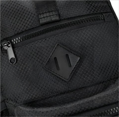 Black sport crossbody sling bag with mesh texture diamond-shaped leather patch and black zipper details