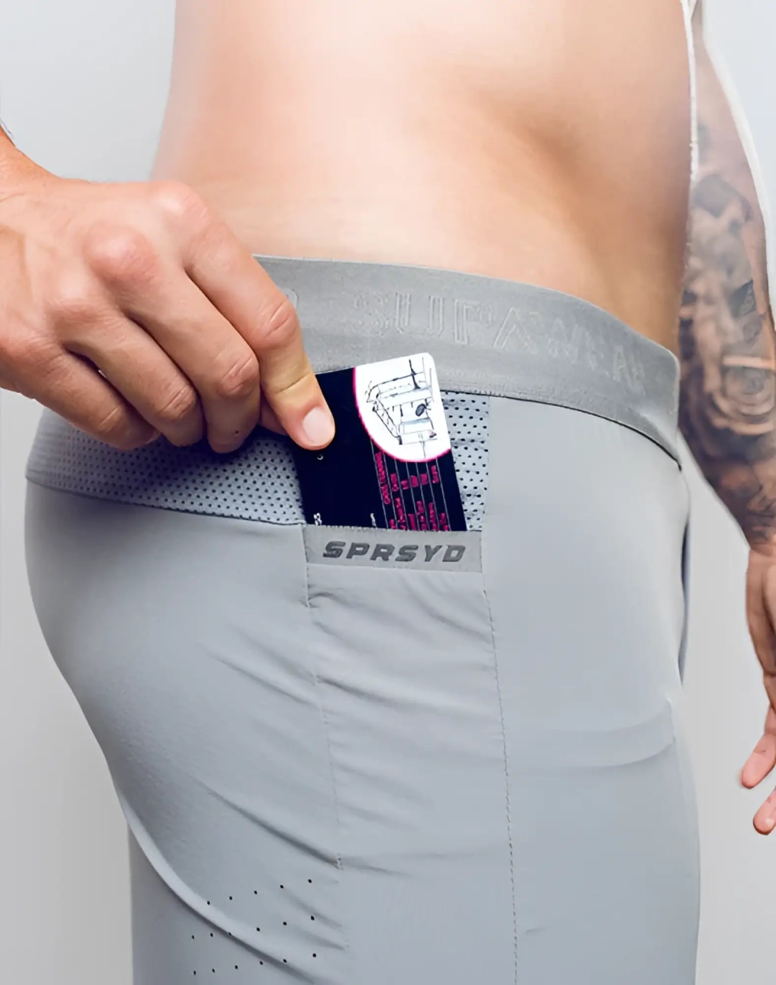 Gray spr flex short athletic briefs with mesh waistband and branded pocket for breathable support