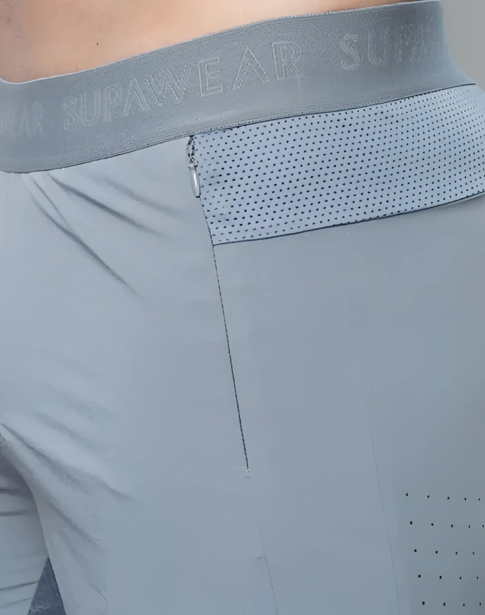 Gray spr flex short athletic shorts with perforated mesh panel and elastic waistband featuring supawear brand name