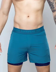 Teal spr flex short athletic shorts with matching elastic waistband and dark blue inner lining for workout use