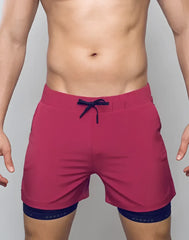 Spr max short magenta athletic shorts with navy blue drawstring and matching inner layer for sports and workouts