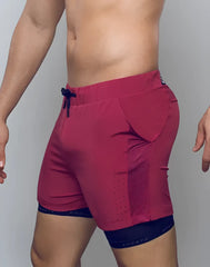 Spr max short red athletic shorts with navy blue drawstring mesh paneling and double layer design for performance use