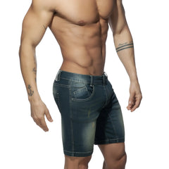 Dark blue denim squat bermuda jeans shorts with faded wash and visible stitching