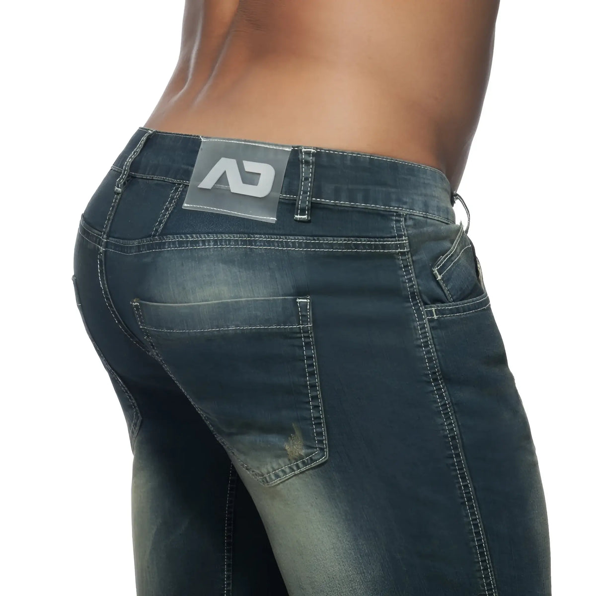 Dark wash squat bermuda jeans showing the back with sleek design, contrasting stitching, and branded waistband patch