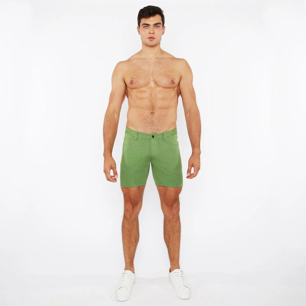 Green stretch knit shorts with a clean tailored fit and subtle stitching details for comfortable wear