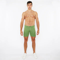 Green stretch knit shorts with a clean tailored fit and subtle stitching details for comfortable wear