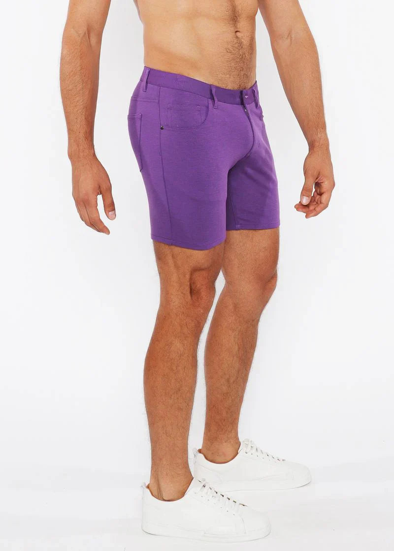 Purple stretch knit shorts for men with tailored fit and classic five-pocket design in soft stretch fabric