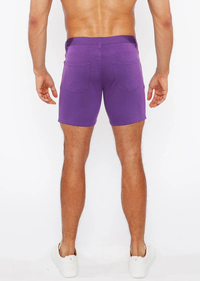 Back view of purple stretch knit shorts with a straight-leg cut and two back pockets for casual wear