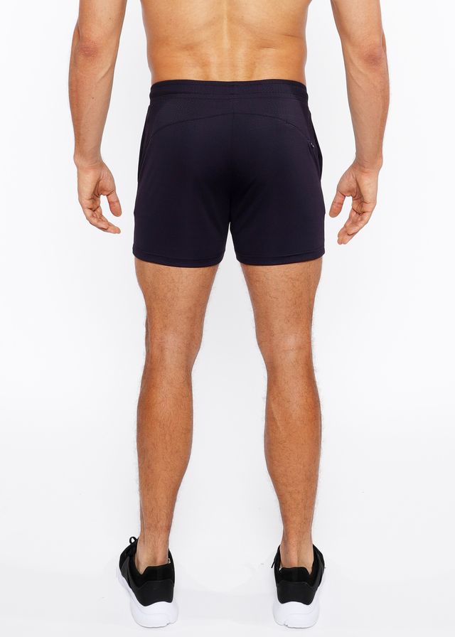 Black textured mesh stretch performance shorts with sleek form-fitting design and subtle side pockets