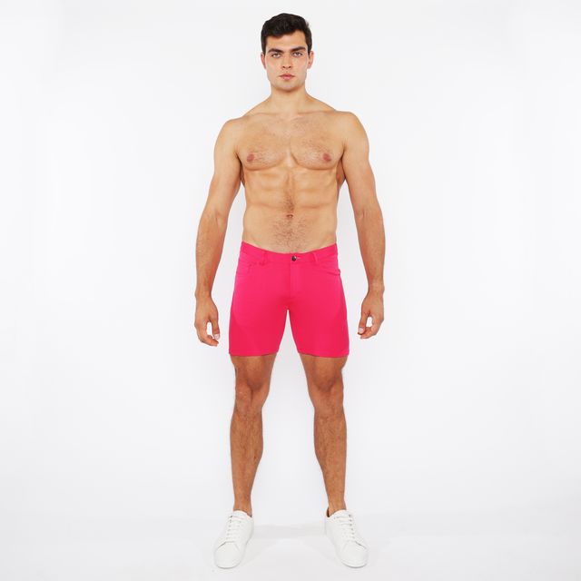 Bright pink stretch knit shorts with classic five-pocket design and button closure for comfortable wear