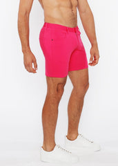 Bright pink stretch knit shorts for men with tailored fit and classic five-pocket design