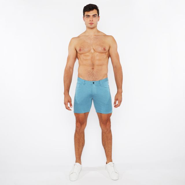 A pair of light blue stretch knit shorts with a form-fitting modern design for active wear