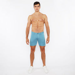 A pair of light blue stretch knit shorts with a form-fitting modern design for active wear