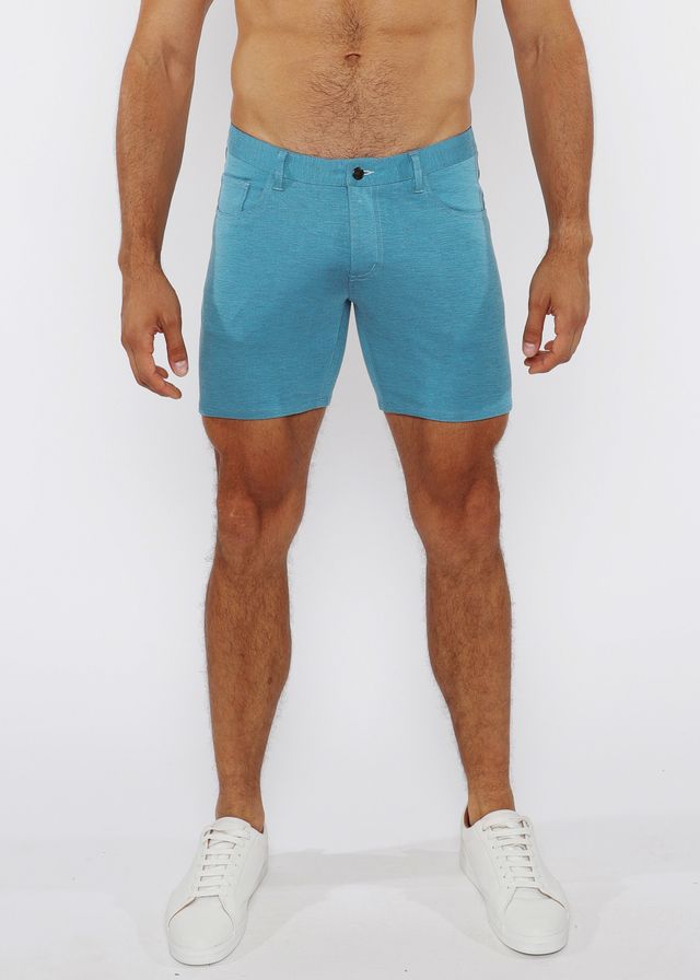 Turquoise stretch knit short in slim fit with textured fabric classic five-pocket design and black button closure