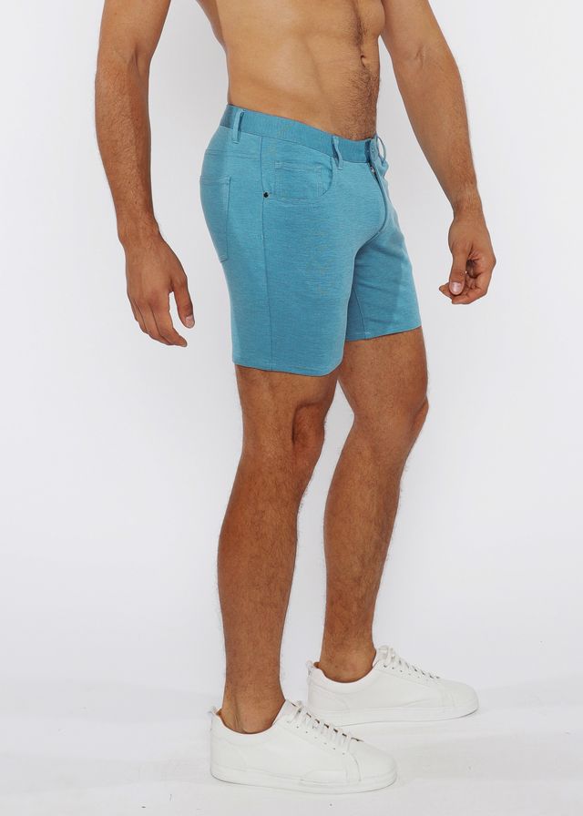 A pair of men’s light blue stretch knit shorts with tailored fit and visible stitching details