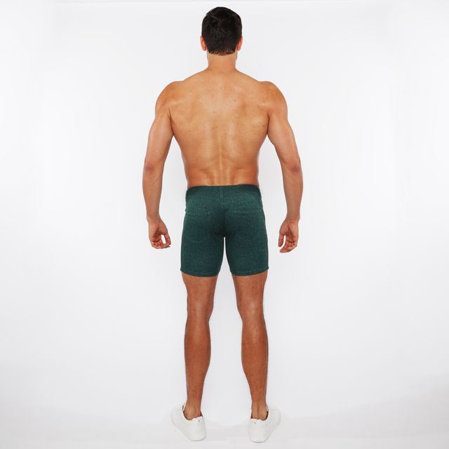 Dark green fitted washed denim stretch knit shorts with textured fabric perfect for casual wear