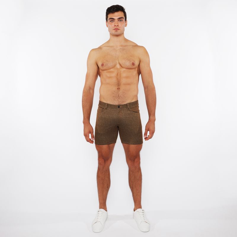 Olive green washed denim stretch knit shorts with textured fabric for comfortable casual wear