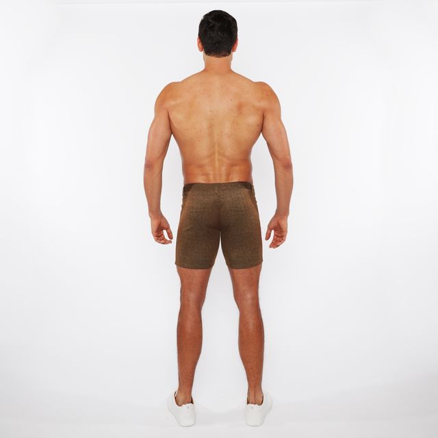 Brown washed denim stretch knit shorts with a subtle textured pattern and form fitting design