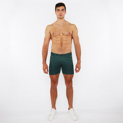 Dark green slim-fit washed denim stretch knit shorts with classic five-pocket design