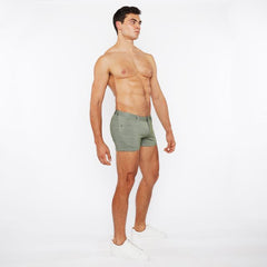 A pair of olive green slim-fit boxer shorts in stretch knit with a subtle textured fabric and modern design