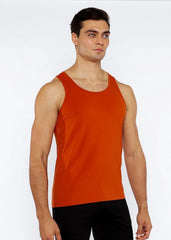 Orange sleeveless athletic tank top made of stretch jersey with circle spine laser cut detail for active wear