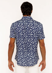 A navy blue short-sleeved squiggly print open knit shirt with bold white abstract pattern and button-up front