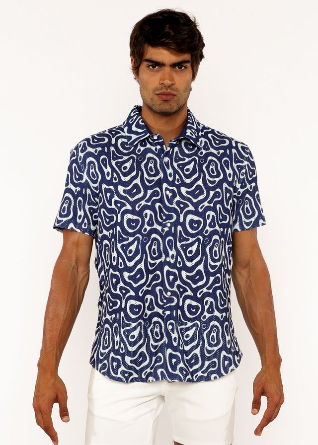 A navy blue short-sleeved squiggly print open knit shirt with a white abstract pattern for casual wear
