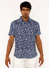 A navy blue short-sleeved squiggly print open knit shirt with a white abstract pattern for casual wear