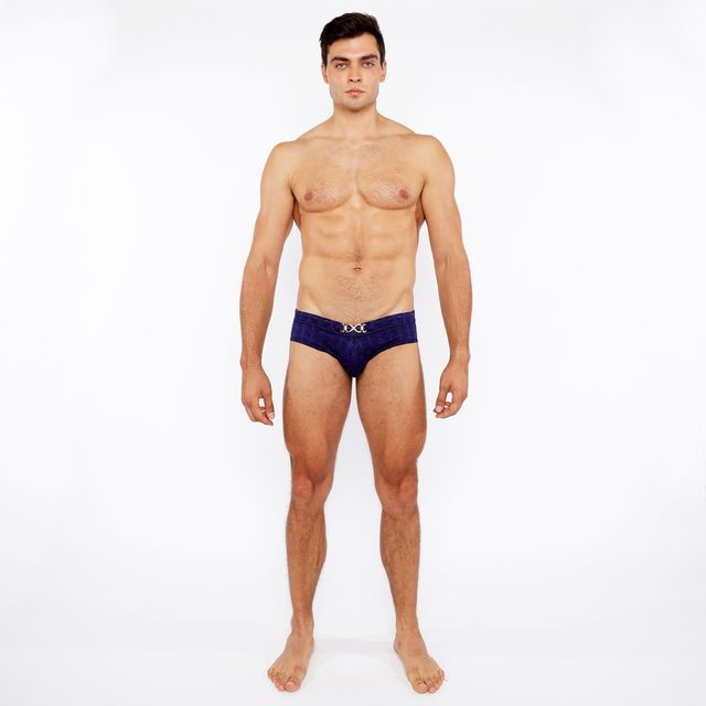 Navy blue textured swim brief with front buckle and metallic silver logo on waistband for men