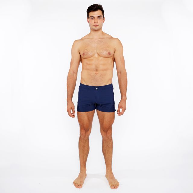 Navy blue pinstripe swim short with a single white button at the waistband for casual beachwear