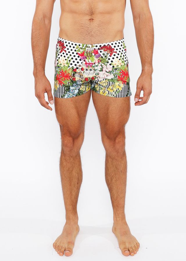 Dots abstract printed swim shorts featuring vibrant floral and polka-dot patterns in white red green and black