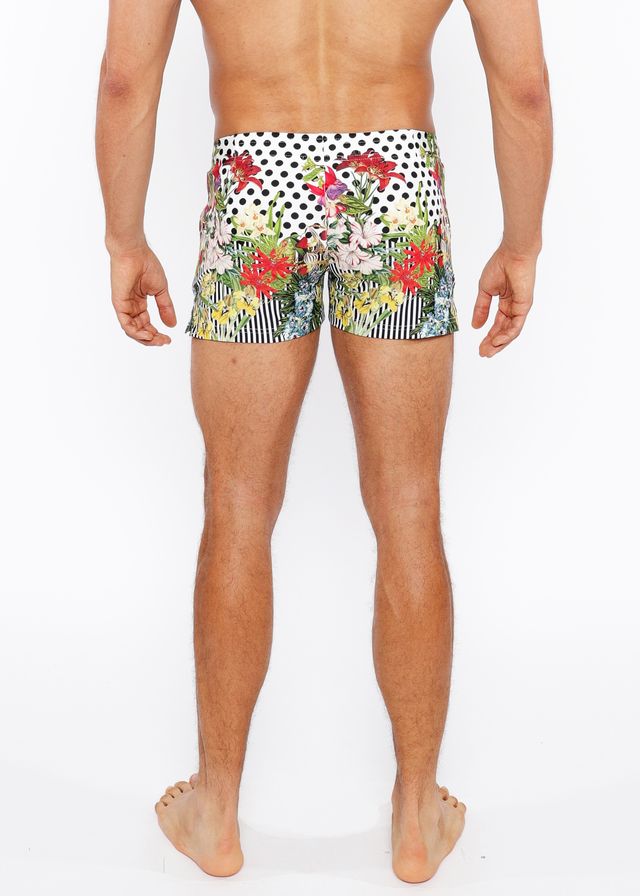 Dots abstract printed swim shorts featuring vibrant floral and polka-dot patterns with red pink green and yellow blossoms