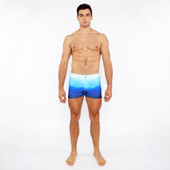 Men’s gradient printed swim shorts with blue ocean gradient design made from stretchy fabric for comfort and flexibility