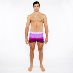 Purple gradient printed swim shorts with white waistband designed for comfortable beach and pool use