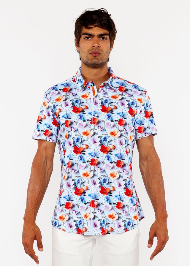 A vibrant white floral 3D print stretch knit shirt with bold red and blue blossoms and pink accents